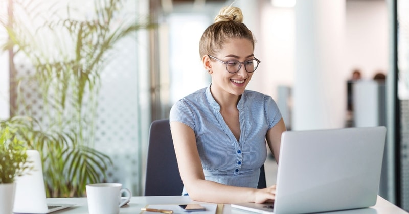 Woman working on a computer.